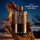 Azzaro cologne bottle on a wooden branch with sunset background