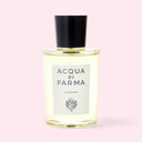 Acqua di Parma cologne bottle on a light pink background