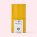 Yellow Acqua Di Parma Colonia Eau de Cologne 100ml packaging on a light pink background