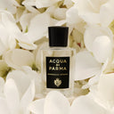 Acqua Di Parma Signatures of the Sun Magnolia Infinita Eau de Parfum 100ml perfume bottle surrounded by white flowers | BEAUTE KNOWS AUS
