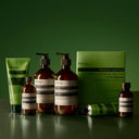 Aesop Aesop Geranium Leaf product range  on a green background