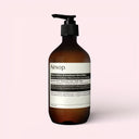 Aesop Resurrection Aromatique Hand Balm 500ml bottle on a light pink background