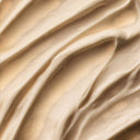Close-up of Aesop Resurrection Aromatique Hand Balm cream texture