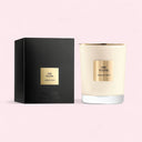 Candle and packaging with 'The Yulong Armani Prive' branding on a pink background