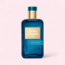 Blue Atelier Cologne Gaïac Éternel Eau de Parfum 100ML bottle with gold cap on a light pink background | BEAUTE KNOWS AUSTRALIA