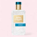 Atelier Cologne Clémentine California Cologne Absolue Eau de Parfum 100ML Perfume bottle with gold and blue cap on a light pink background | BEAUTE KNOWS AUSTRALIA