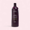 Aveda invati ultra advanced conditioner bottle on a light pink background