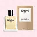 Burberry Hero perfume bottle and packaging on a light pink background