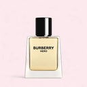 Burberry Hero perfume bottle on a light pink background