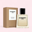 Burberry Hero perfume bottle and packaging on a light pink background