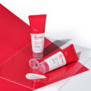 BEAUTE KNOWS Two red and white Beauty of Majesty BOM AC Red Free Cream 50ml tubes on a red and white background