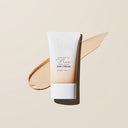 Beauty of Majesty BOM Foundation-Free Tone Cover Sun Cream SPF50+PA++++ 50g tube with a swatch of cream on a beige background