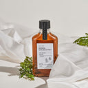 Bottle of Beauty of Majesty BOM Just One Artemisia Capillaris Extract Toner 150ml with a label on a white fabric background
