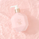 Pink Beauty of Majesty BOM LIGHT ON In Shower Body Tone Up Lotion 290ml bottle with pump on a pink liquid textured background