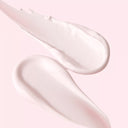 Pink cream swatches of Beauty of Majesty BOM LIGHT ON In Shower Body Tone Up Lotion 290ml on a pink background