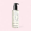 Bobbi Brown soothing cleansing oil bottle on a light pink background