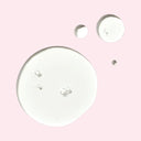 Bobbi Brown Soothing Cleansing Oil on a pink background