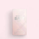 Burberry Brit Sheer perfume packaging on a light pink background