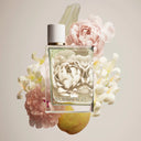 Burberry perfume bottle with floral design on a light background