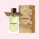 Burberry Oud Storm perfume bottle and packaging on a light pink background