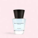 Burberry Touch for Men perfume bottle on a light pink background