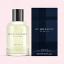 Burberry Weekend for men perfume bottle and packaging on a light pink background