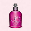 Pink Cacharel Amor Amor In A Flash Eau de Toilette perfume bottle with silver cap on a light pink background