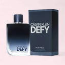 Calvin Klein Defy perfume bottle and packaging on a light pink background
