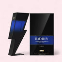Carolina Herrera Bad Boy Cobalt Elixir eau de parfum perfume bottle and packaging on a light pink background