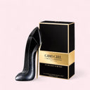 Carolina Herrera Good Girl Supreme Eau de Parfum perfume bottle and packaging on a light pink background