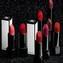Chanel ROUGE ALLURE VELVET NUIT BLANCHE lipsticks in various shades on a black glittery background