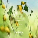 Chanel Chance Eau Fraîche Eau de Toilette 35ml perfume bottle with lemon tree branches and 'Chance Eau Fraçè' text on a blurred green background