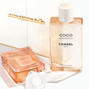 Chanel Coco Mademoiselle perfume and body oil with the set packaging in the background