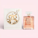 Chanel Coco Mademoiselle Eau De Parfum 100ml perfume bottle and packaging on a pink background