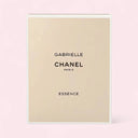 Chanel Gabrielle Essence Eau de Parfum 100ml golden bronze packaging with black text on a pink background