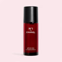 Red N°1 De Chanel Revitalizing Eye Serum 15ml bottle with black cap on a light pink background