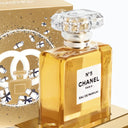 Chanel No. 5 eau de parfum perfume bottle with gold packaging