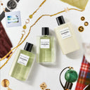 3 Chanel Paris Edimbourg EDT 125ml  perfume bottles on a decorative surface with jewelry and a watch.