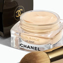 Chanel Sublimage Le Teint Cream Foundation 30g - 01 Beige with a brush on a white background