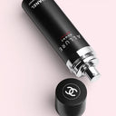 BEAUTE KNOWS Chanel Allure Homme Sport All-Over Body Spray 100ml deodorant spray bottle on a pink background