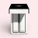 BEAUTE KNOWS 2 Chanel Rouge Allure Velvet Nuit Blanche Lipsticks in case with a pink gradient background