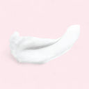 White gel texture of Chantecaille Vital Essence 50ml content on a pink background