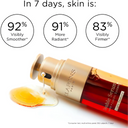 Clarins Double Serum Light Texture bottle with skin improvement statistics on a white background