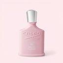 BEAUTE KNOWS Pale pink Creed Spring Flower Eau De Parfum 75ml perfume bottle on a light pink background
