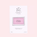 BEAUTE KNOWS Creed Spring Flower Eau De Parfum 75mlr perfume packaging box on a light pink background
