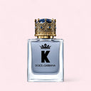 Dolce & Gabbana K Eau De Toilette 50ml perfume bottle with decorative cap on a light pink background