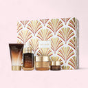 Estée Lauder The Lift + Glow Routine Magical Skincare Moments Set with gift box on a pink background