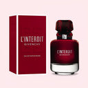BEAUTE KNOWS Givenchy L'interdit Rouge Eau De Parfum 80ml perfume bottle and packaging box on a light pink background