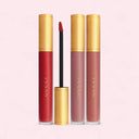 Gucci matte lip liquids with gold caps on a pink background