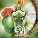 BEAUTE KNOWS Jean Paul Gaultier Le Beau Paradise Garden Eau De Parfum 125ml perfume bottle with fig and coconut elements on a green background